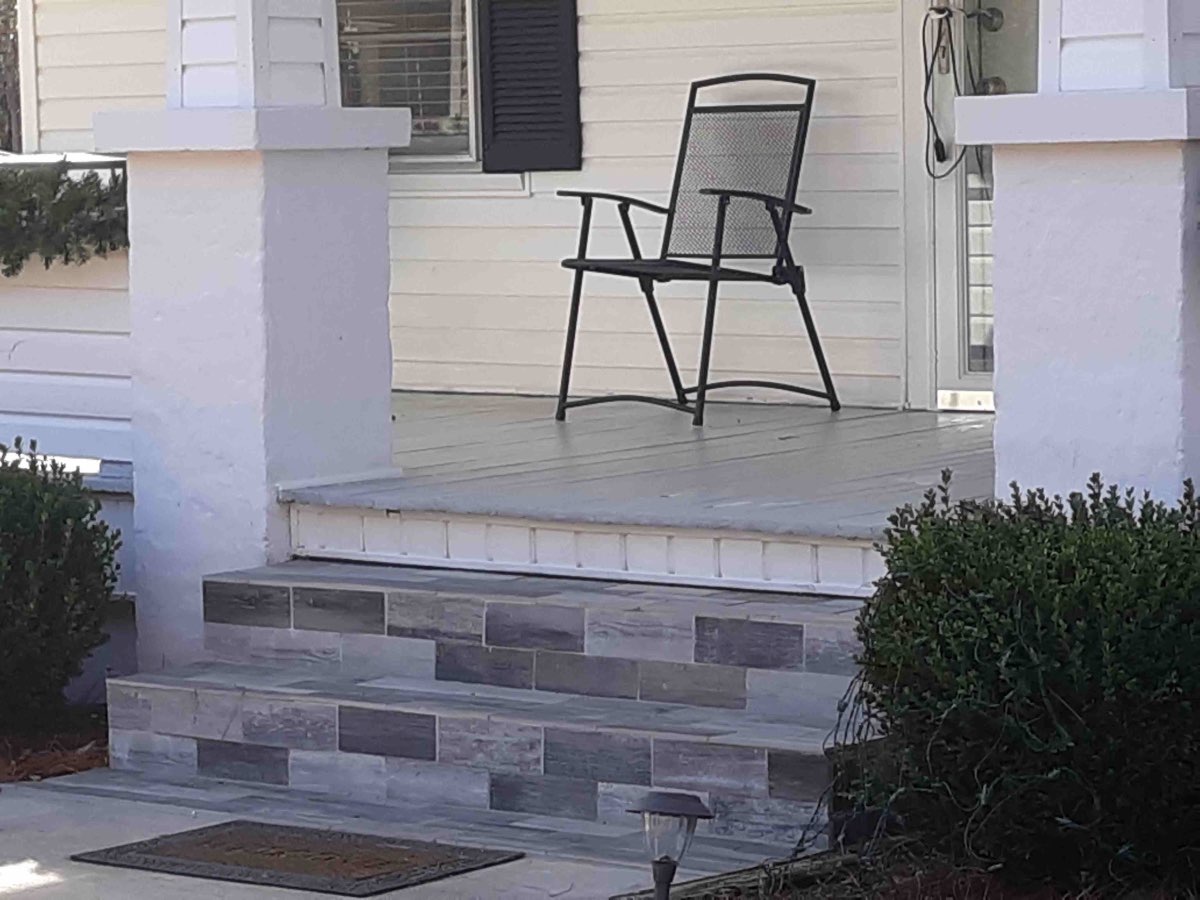 Front porch with new stone-paver steps built by Hometown Handyman